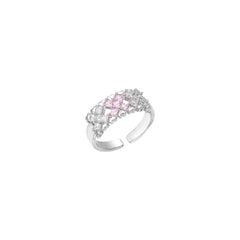 White gold plated adjustable ring with three rows of square zirconia stones in black or pink chevron pattern