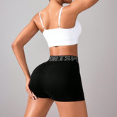 Nahtlose Sport-Shorts mit elastischem Jacquard-Bund und Buchstabenprint, ideal für Yoga, Laufen und Workouts. Schnelltrocknend und atmungsaktiv.