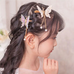 Haaraccessoires für Damen: Haarstyling mit Quaste und Schmetterlingsmotiv, glänzende Haarspangen, fliegende Haarspange