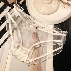 Sexy Damen-Slip, transparent, rosa, mit Schleife, Baumwollzwickel, atmungsaktiv, aus Mesh, mit Wellenkante und Lochmuster.