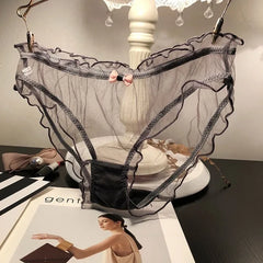 Sexy Damen-Slip, transparent, rosa, mit Schleife, Baumwollzwickel, atmungsaktiv, aus Mesh, mit Wellenkante und Lochmuster.
