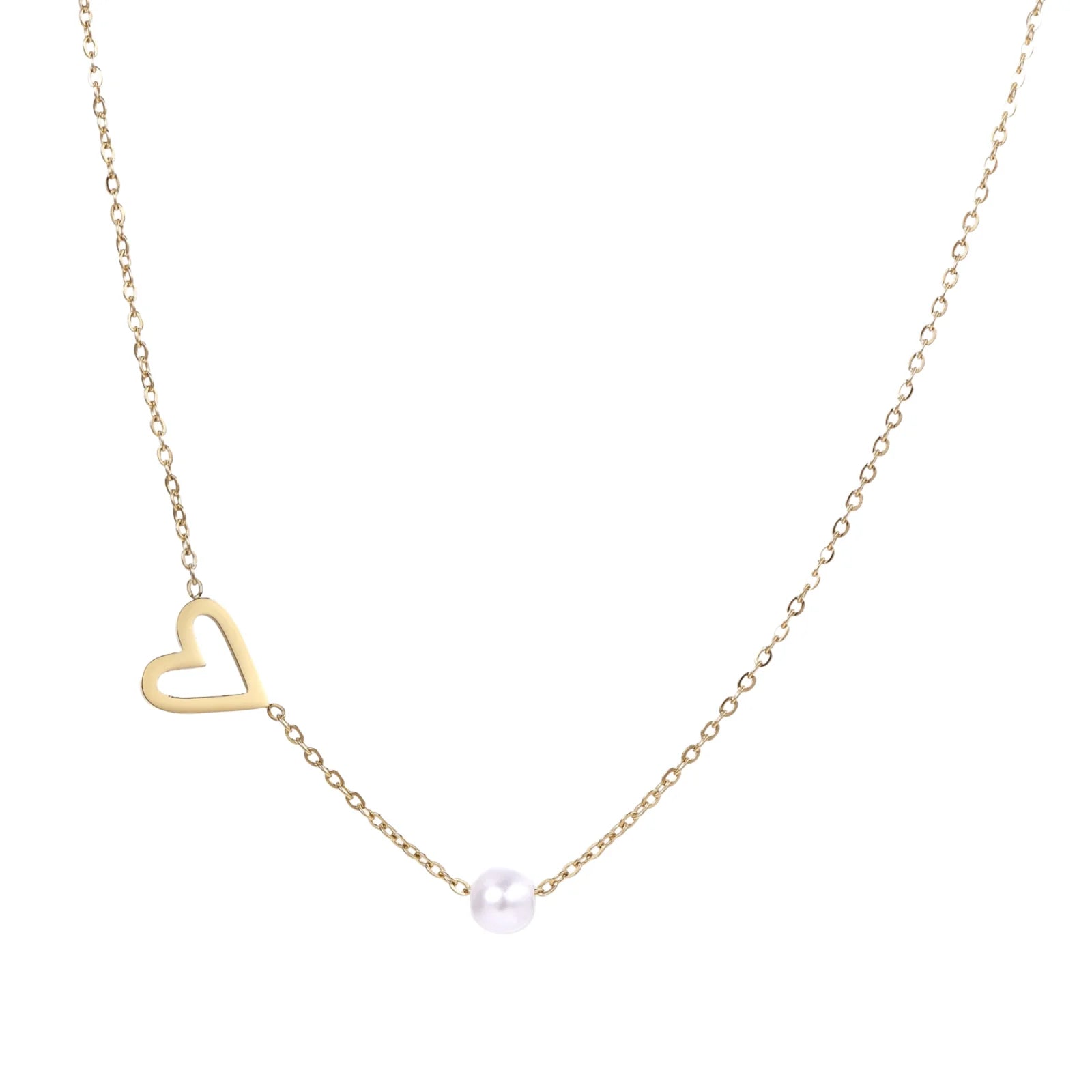 Delicate gold necklace with open heart charm and white pearl bead on fine chain against cream background