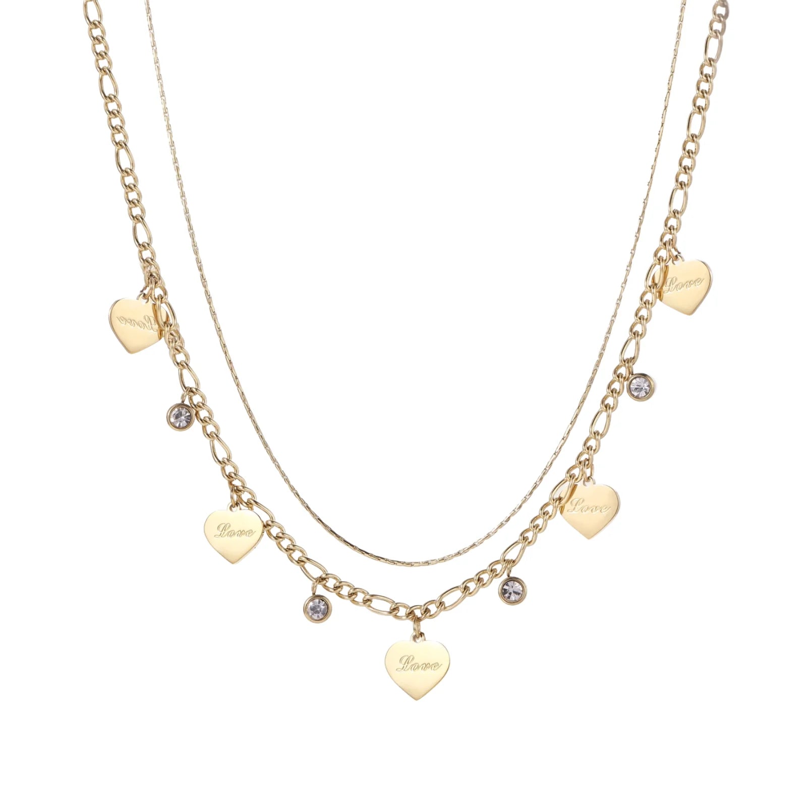 Gold layered necklace set with engraved heart pendants and crystal accents on cream background