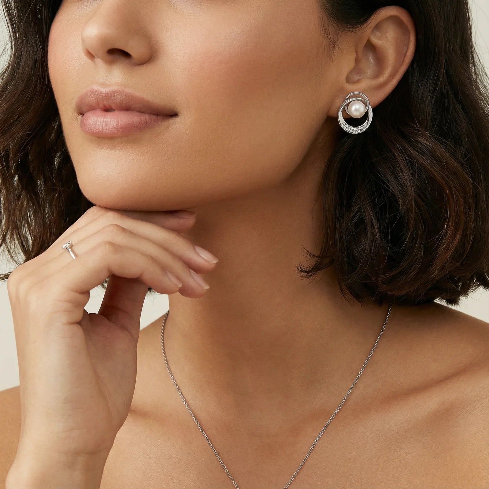 Pearl Orbit Studs - kinko Global Holdings inc