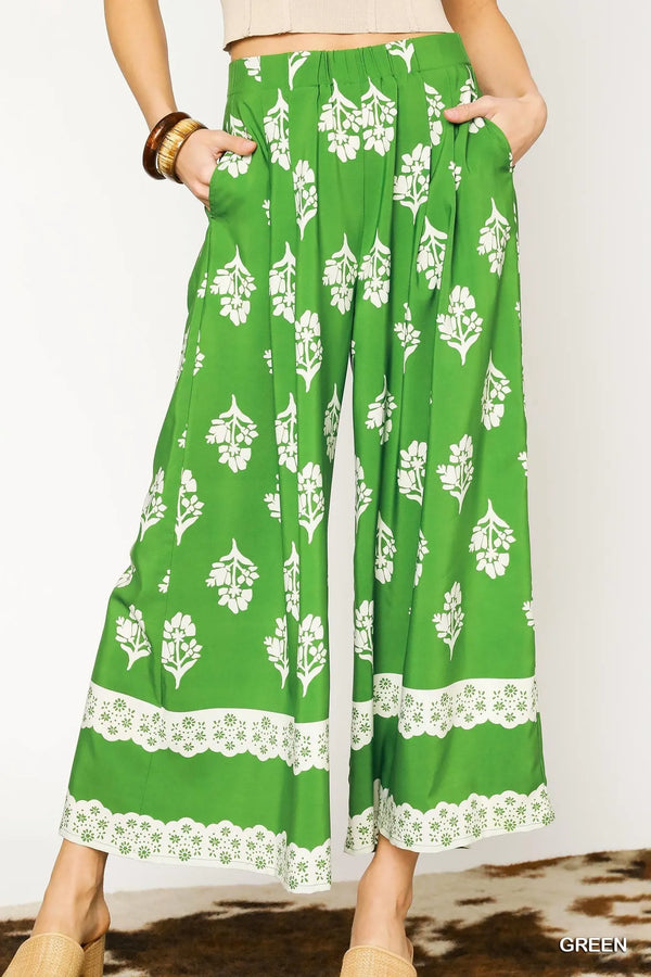 Umgee – Geblümte, plissierte Hose mit weitem Bein