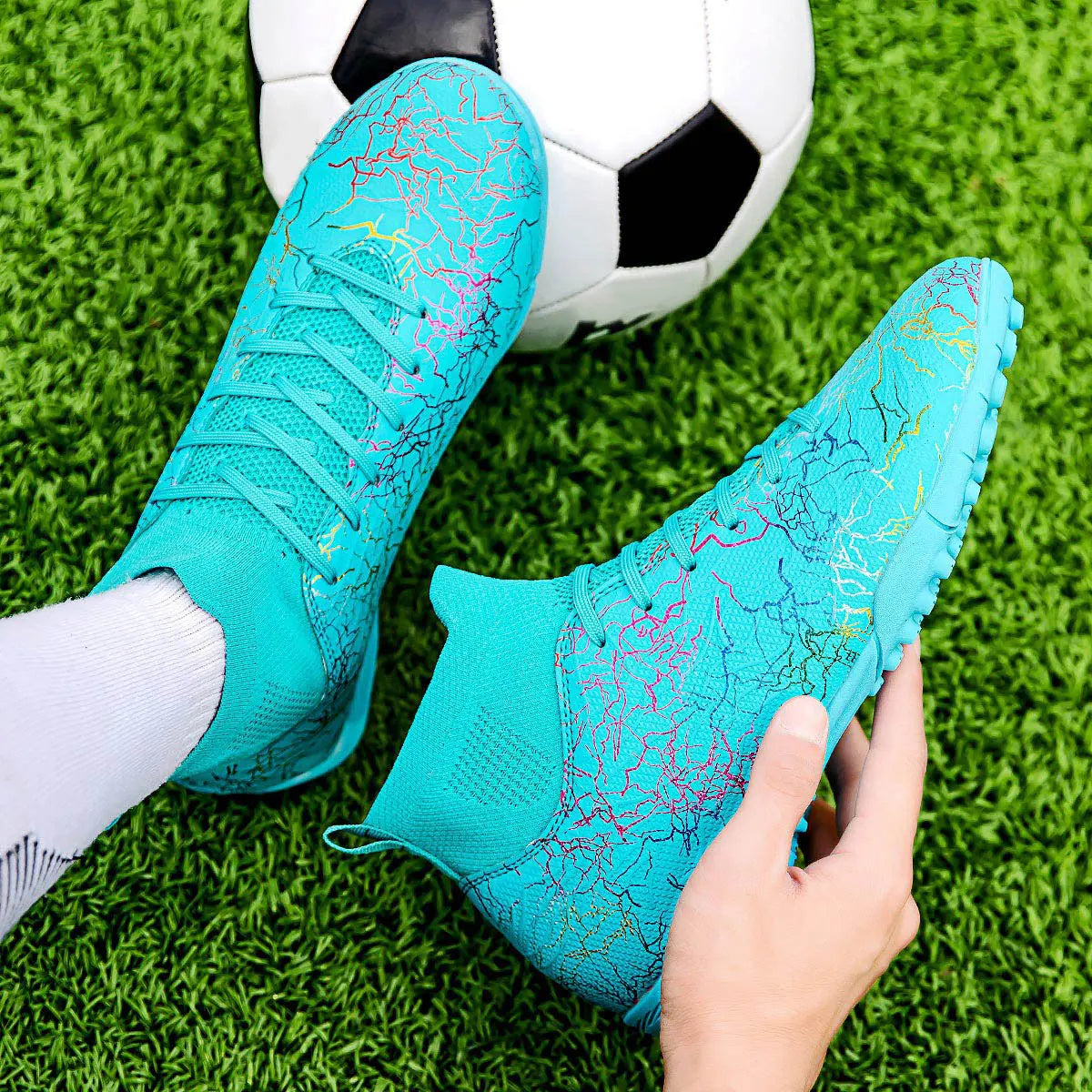 Outdoor soccer shoes for men and women; professional sports shoes for grass with short studs and anti-slip and wear-resistant.