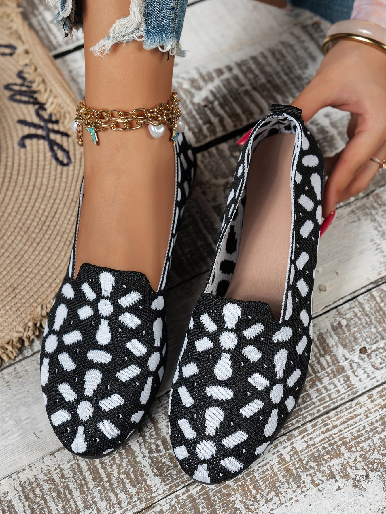 Women's shoes with niche-designed patterns, featuring comfortable flat soles, suitable for various outfits.