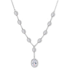 Elegant white gold plated jewelry set with oval cubic zirconia stones in halo settings, featuring Y-necklace and drop earrings.