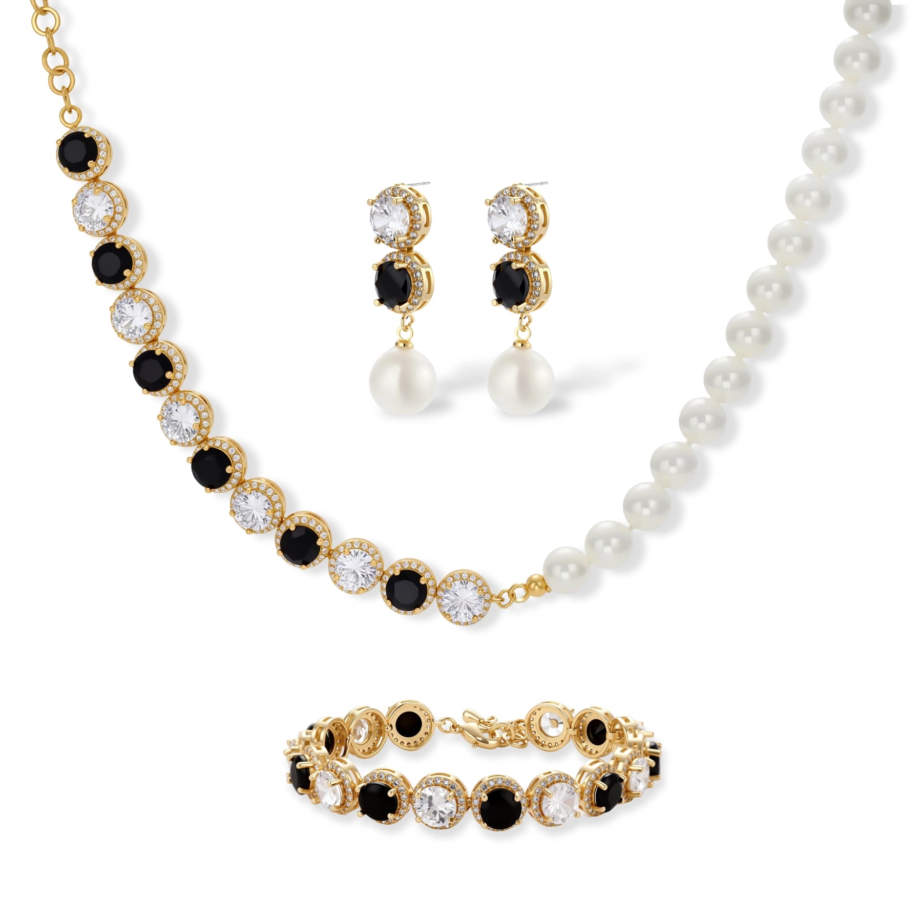 Gold-plated jewelry set with alternating black and clear cubic zirconia stones, featuring necklace, earrings and bracelet
